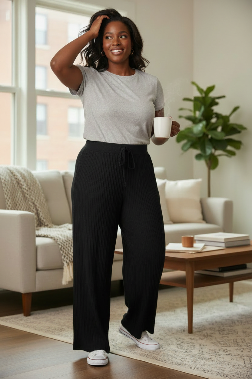 Confident plus-size lifestyle photo in a realistic apartment setting